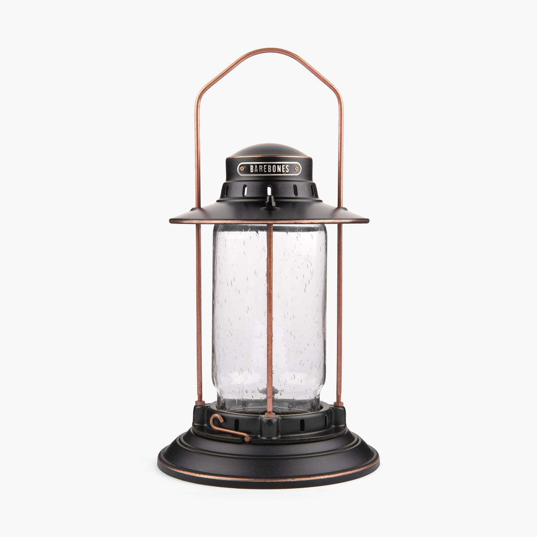Barebones Vintage-style Hurricane Lantern with clear seaded glass and bronze metal accents on a white background
