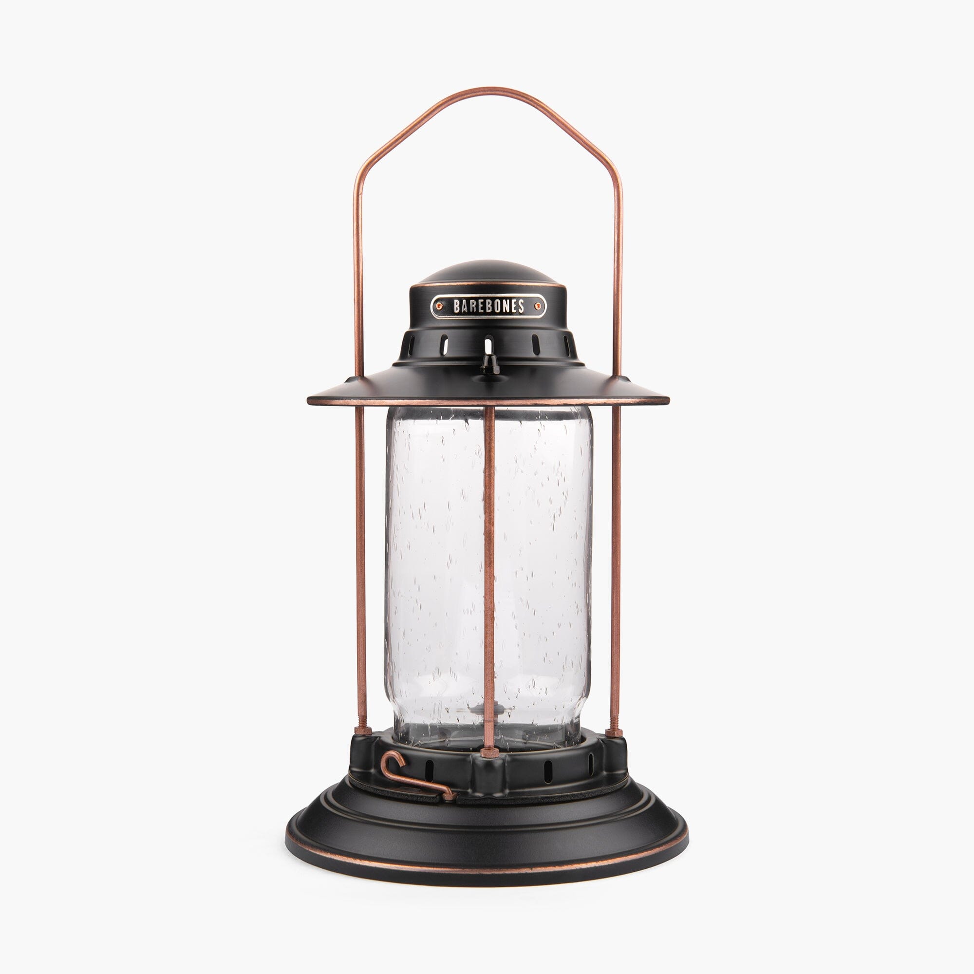 Barebones Vintage-style Hurricane Lantern with clear seaded glass and bronze metal accents on a white background